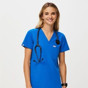 One-pocket scrub top